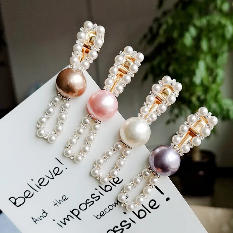 

2019 new hairpins ins pearl net red with the bow tie duckbill clip rhinestone card temperament Liu seaside clip