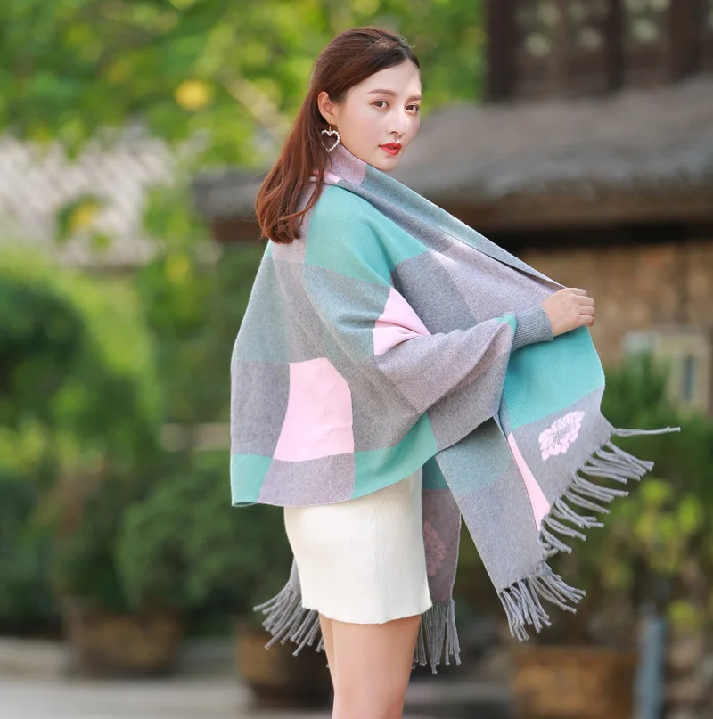 Female autumn and winter large plaid shawl dual-use cloak tassel double-sided jacquard bat sleeve sweater jacket