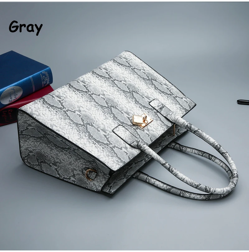 Высокое качество Змеиный узор Женская сумка Новая мода Личность большой емкости Повседневная дикая сумка через плечо