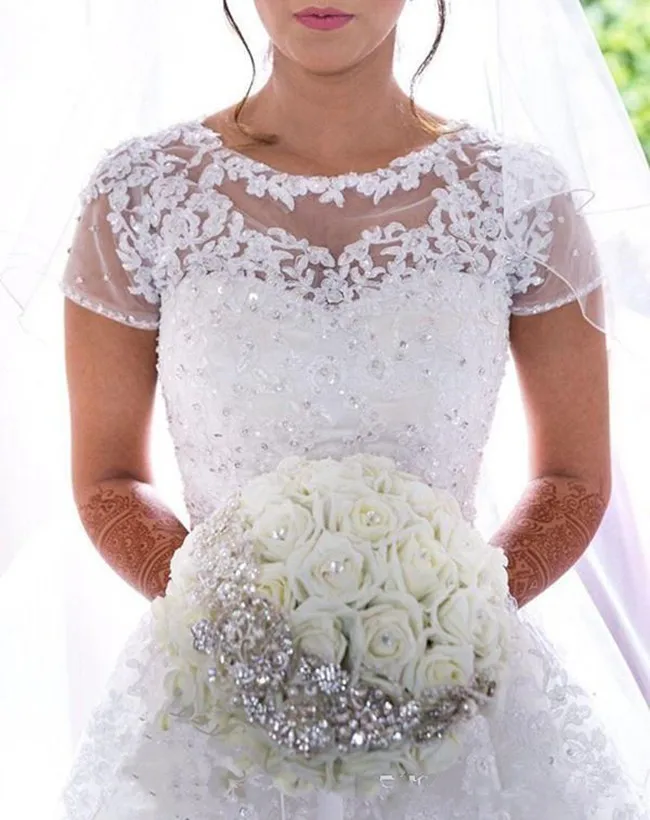 2018-a-line-country-wedding-dresses-jewel-cap-sleeve-sweep-train-bridal-gowns-with-applique-beads-tulle-plus-size-wedding-dress (4)