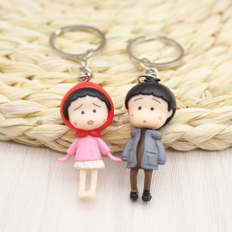 Nueva historieta 4 estilos niño y niña llavero aleación resina PVC llavero bolsa colgante Juguetes chaveiro llavero