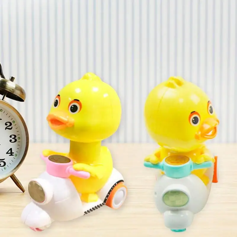 Baby Cartoon Doll Pressing Force Duck Motorcycle Squeeze Toy for Children Kids Claaical Toys Funny Wind Up Toys for Baby Gifts