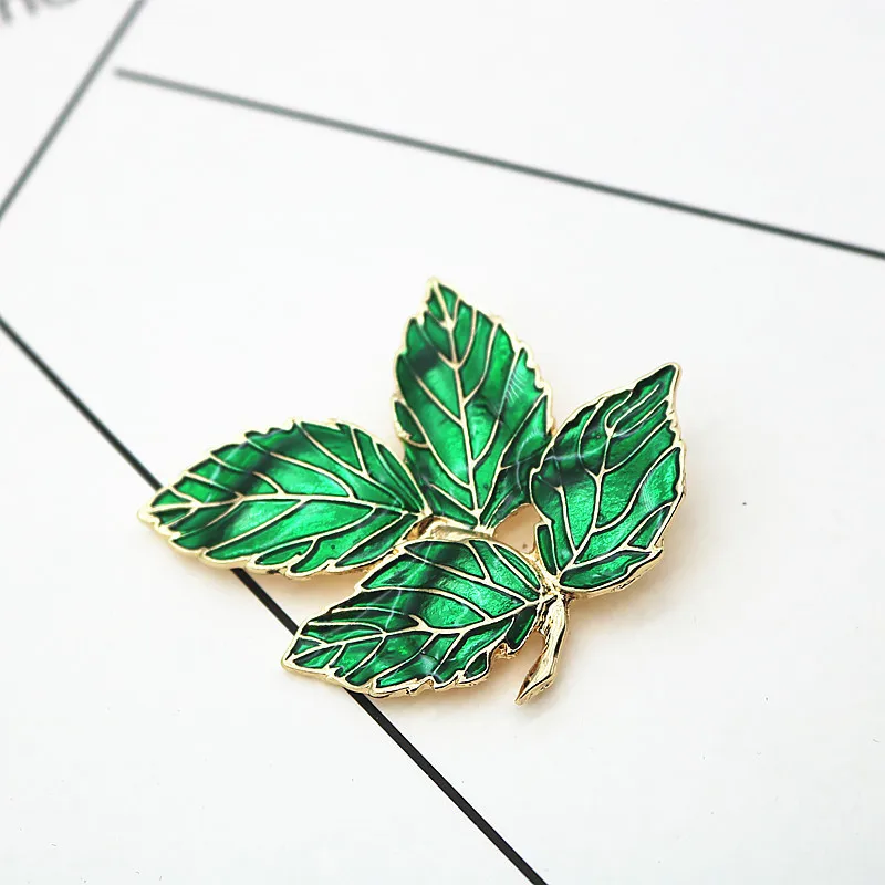 

New European and American brooch Enamel leaves green leaves delicate brooch scarves dual-use buckle brooch female