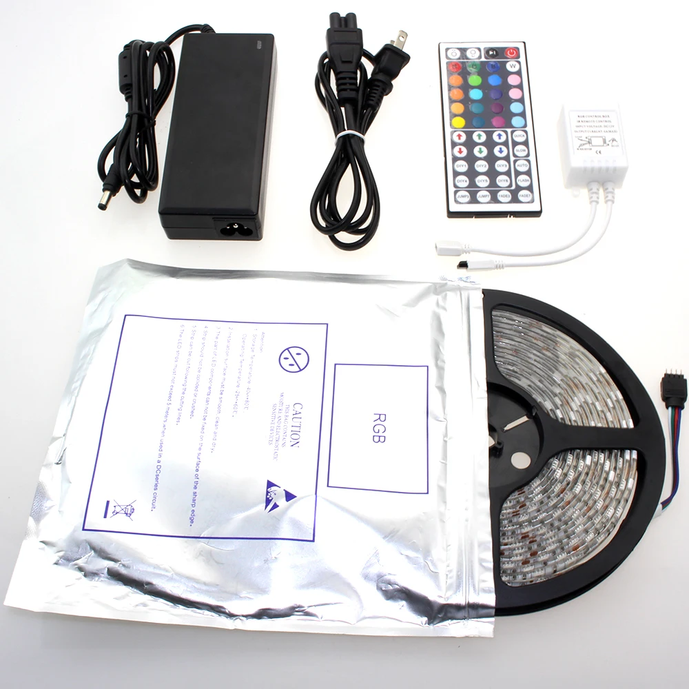 

Hot sale suit SMD led strip 5050 waterproof rgb led strip IP65 5M 300 LEDs/Roll + 44 keys IR Remote+12V 6A Power Adapter