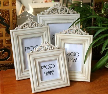

Home decoration picture frames home decoration photo frame pure hand made wooden carved fashion combination frame set of 4