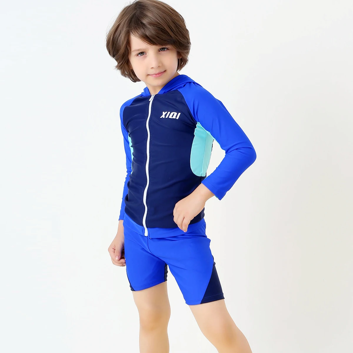 Boys All in One Swimsuits This all in one swimsuit for younger boys is perfect for holiday season or simply for swimming lessons. Featuring sleeves and legs and a cute monkey print.