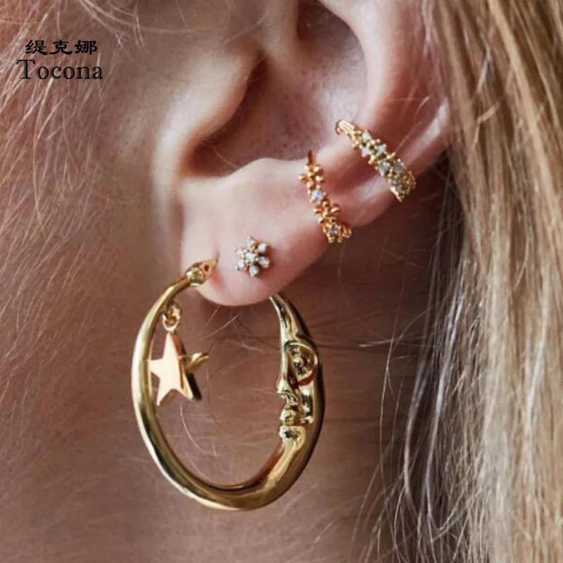 

Tocona 4pcs/sets Punk New Arrival Gold Color Stud Earrings Sets Round Moon Star Pretty Flowers Celar Crystal Women Jewelry 8060