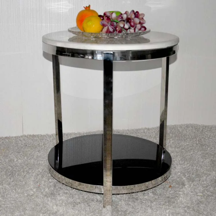 Small round tea table marble. Stainless steel. The sofa side table.