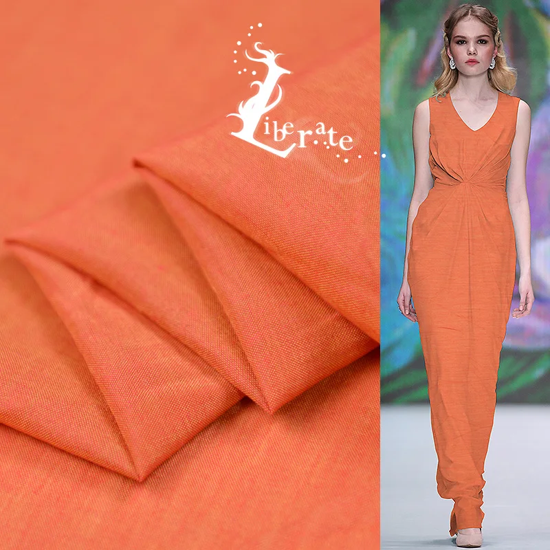 

Elegant Orange Silk Cotton Sheer Fabric Yarn Dyed 2 Tone Silk