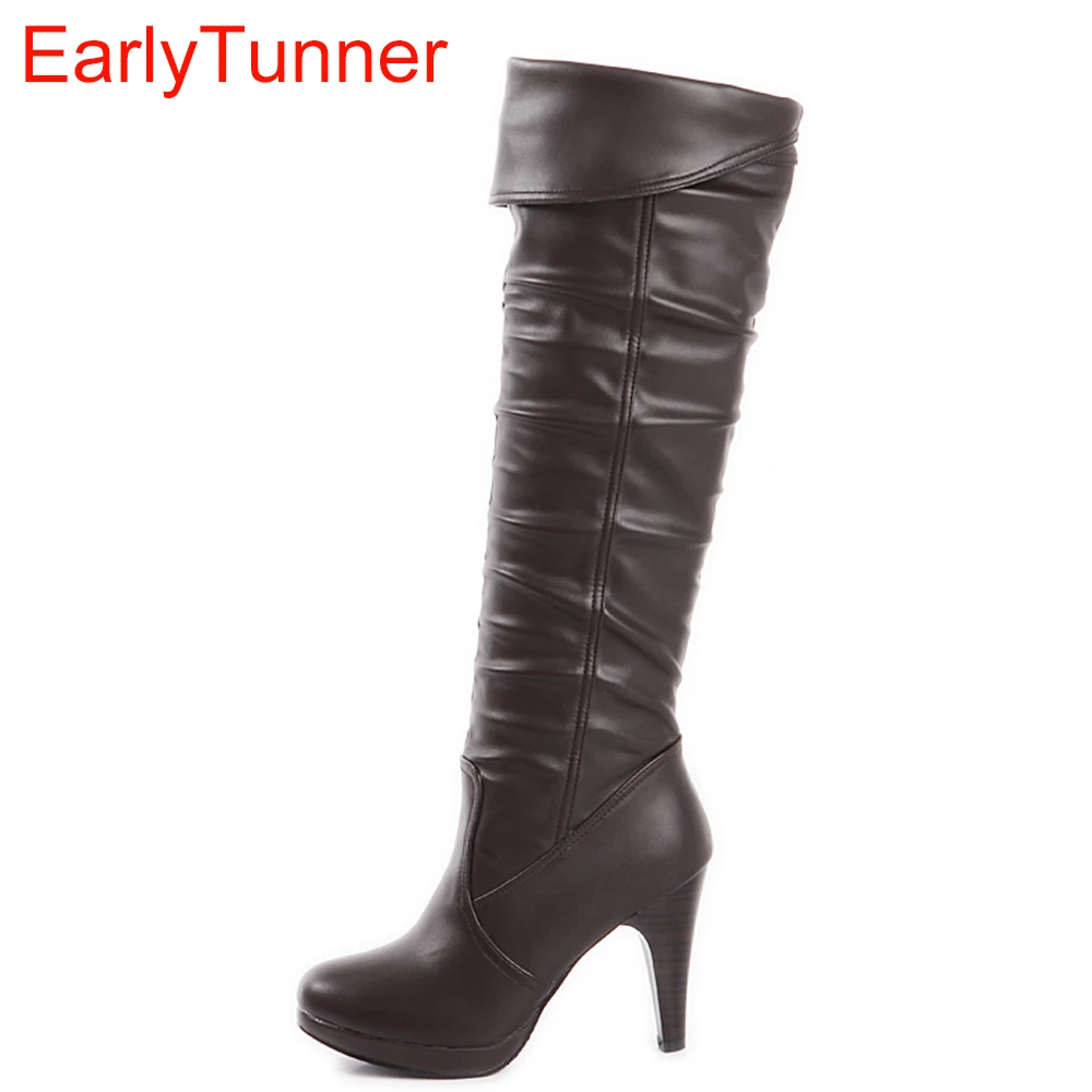 tall black boots with brown heel