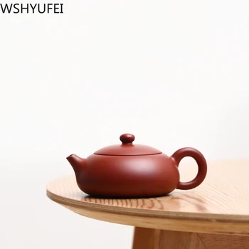 

Zisha pot handmade set authentic Dahongpao Zhu mud flat Xi Shi 180cc small teapot upgrade flat ball hole tea cup multi-purpose