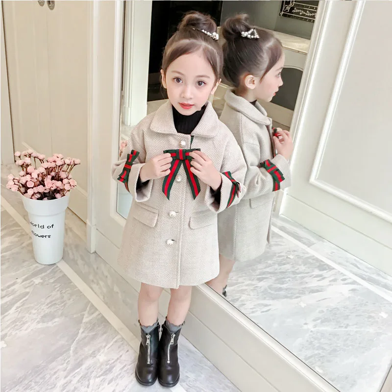 

children's jacket 2019 winter new girls coat Korean version of the long section single row pearl buckle coat woolen coat