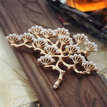 

European trade wholesale jewelry Brand Exported hollow vintage Snow gleams white Christmas pearl pine romantic accessory gift