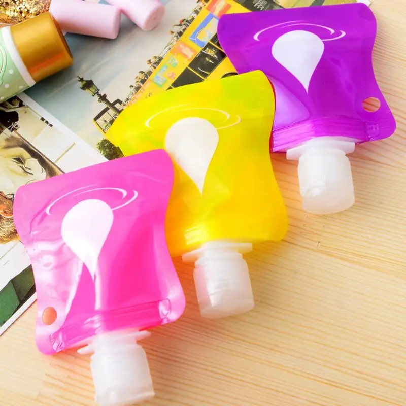 

1Pc Mini Plastic Square Empty Storage Bag Lotion Cream Shampoo Dispenser Water Drop Printed Refillable Bottle Container Flexible