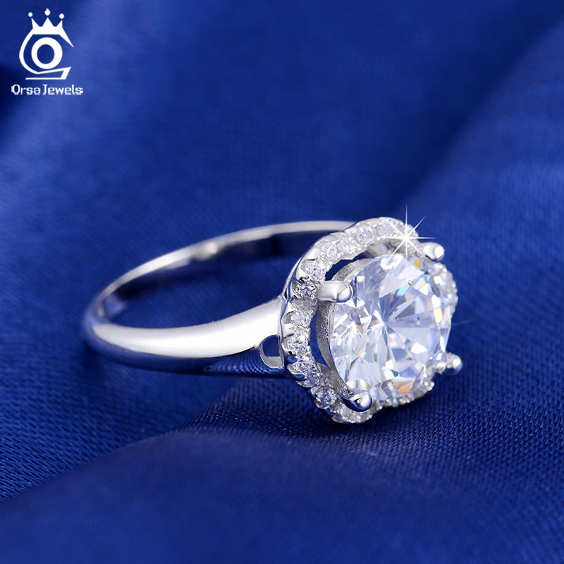 ORSA JEWELS Fashion Jewelry Flower Wedding Ring for Women Engagement Rings with One Big Luxury 2 Carat AAA Cubic Zirconia OR34