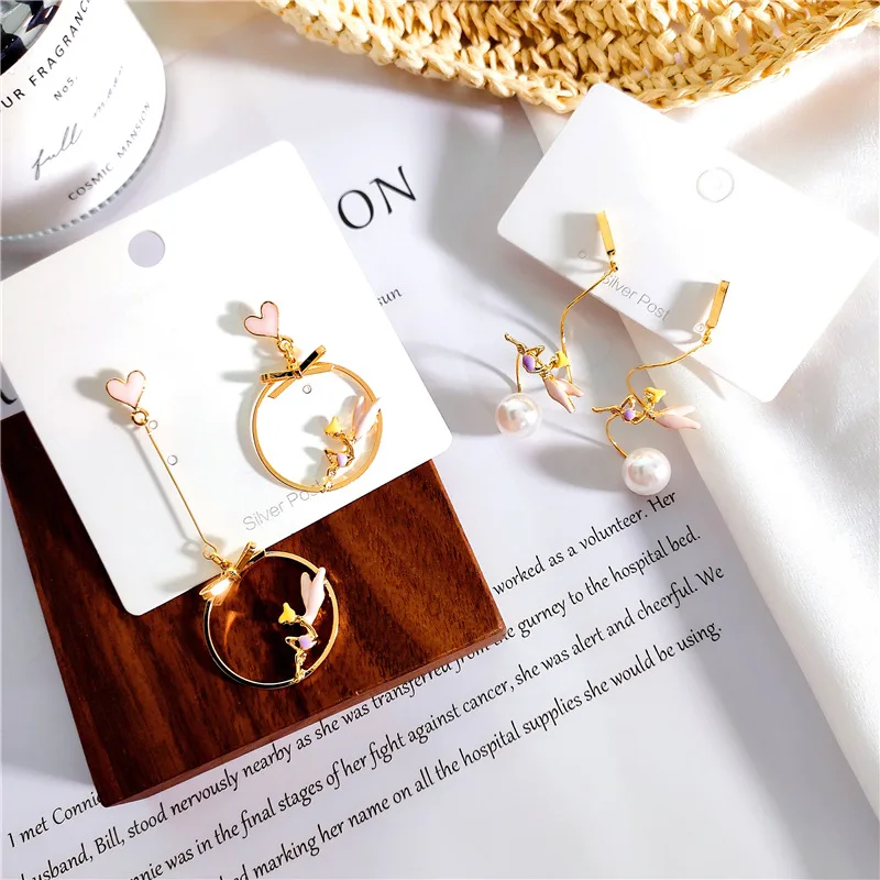 

2019 Korean New Design Fashion Jewelry Curve Elf Angel Earrings Personality Drop Oil Pearl Asymmetric Earrings for women gift