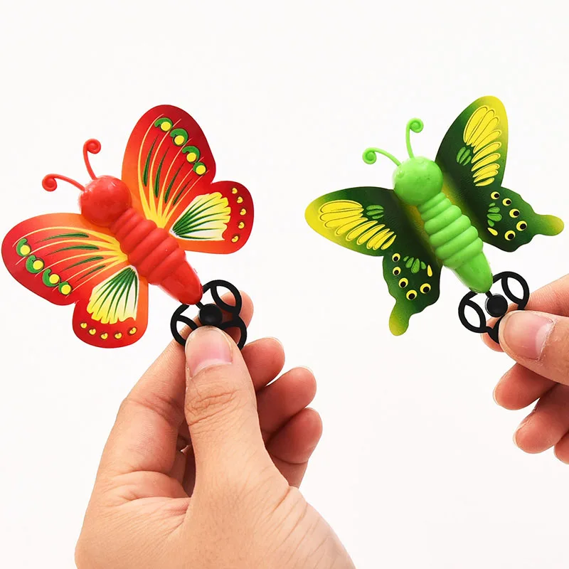 20pcs/Lot Creative Slingshot Flying Butterfly Toys Colorful Catapult