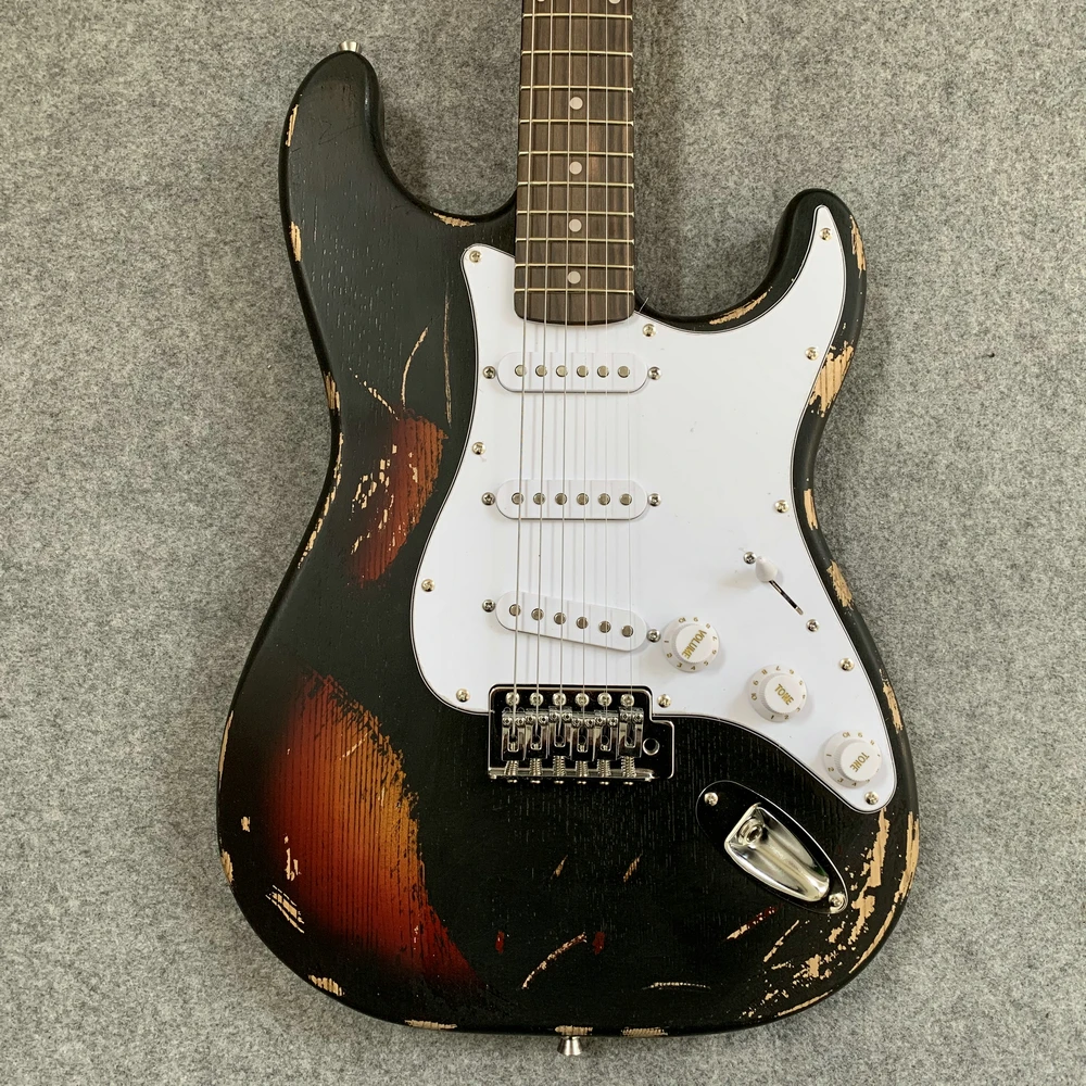 

In stock, retro artifacts real picture ST sunset color electric guitar, old guitar, gift to friends. Free shipping.
