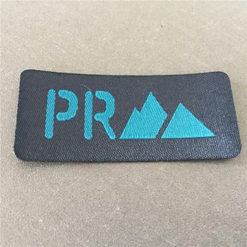 

Factory Price Custom 2.7*6cm Garment Fancy Cutting Woven Patch with Black Fusing Backside