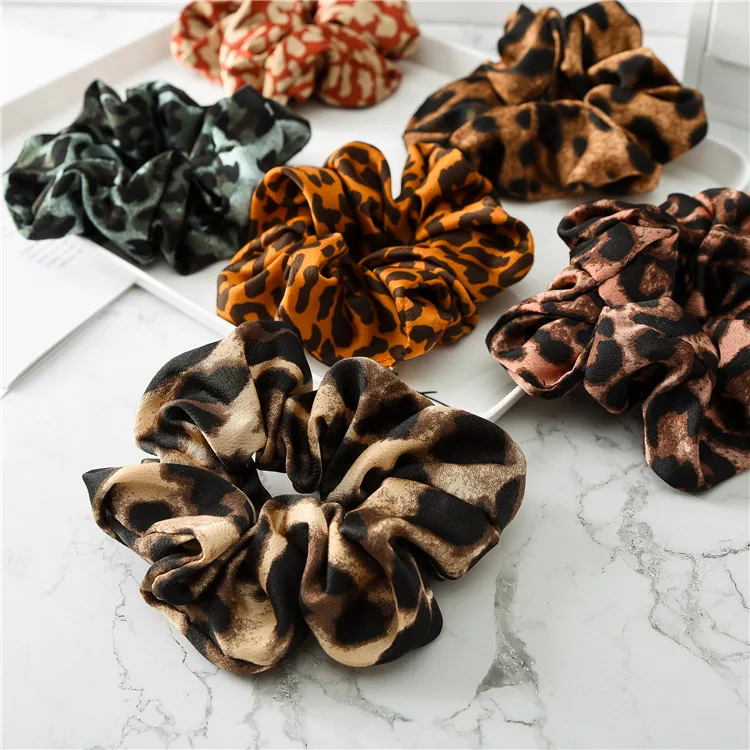 

New arrival Fashion women lovely leopard print Hair bands cute hair scrunchies girl's hair Tie Accessories Ponytail Holder