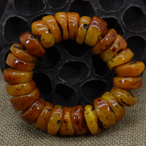 

The Baltic old wax hand chain buddhist beads with the shape ambers bracelet free delivery.