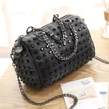 

Casual mini bag shoulder Oblique span bag Spring fashion personality rivet chain handbag