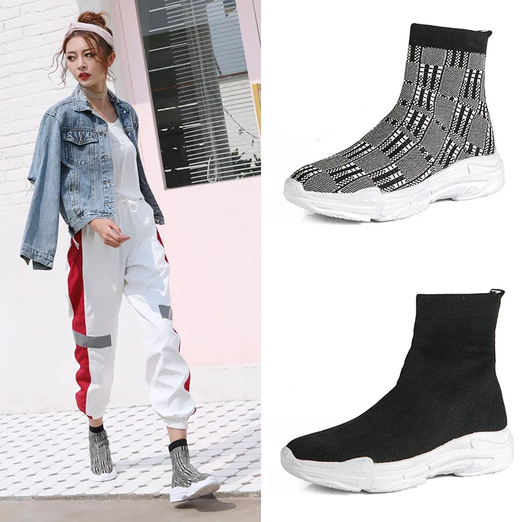 

2018 autumn new Korean version of the thick bottom old shoes high to help socks shoes ladies casual flying woven shoes.