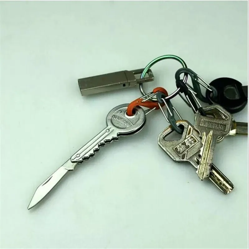 Nuevo 1 pieza Mini clave cuchillo plegable bolsillo cuchillo clave cadena cuchillo pelador portátil acampada llave anillo herramienta