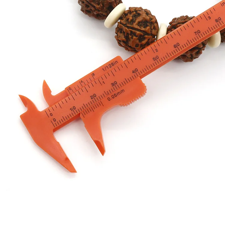 

New 1 Piece Orange 80 Mm Mini Plastic Sliding Vernier Caliper Gauge Measure Tool Ruler Double Scale Millimeter / Inches