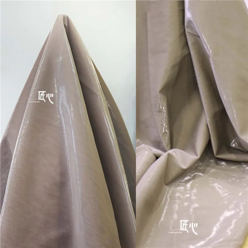 

50cm*150cm/piec Memory silk satin smooth mirror coating silk smooth camel leather PU elastic designer trench coat fabric