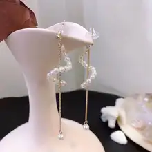 Новые европейские и американские модные темпераментные Длинные спиральные жемчужные женские серьги с кисточками индивидуальные тонкие серьги