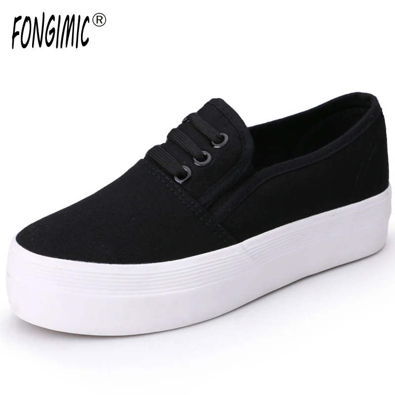 flat black and white shoes
