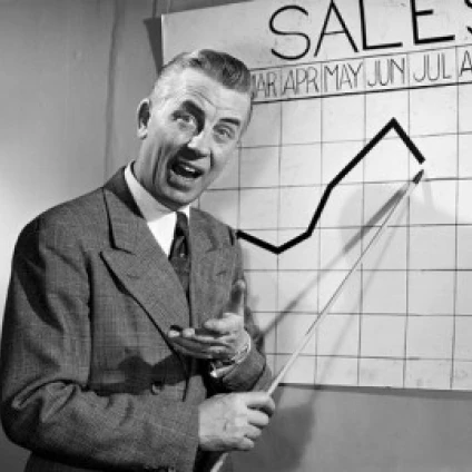 Businessman pointing at sales chart Poster Print (18 x 24)