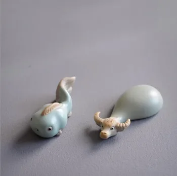 

Mr. Niu and miss fish Creative Miniature Ceramic Mini Tea pet Lovely buffalo and small fish Home Furnishing decoration