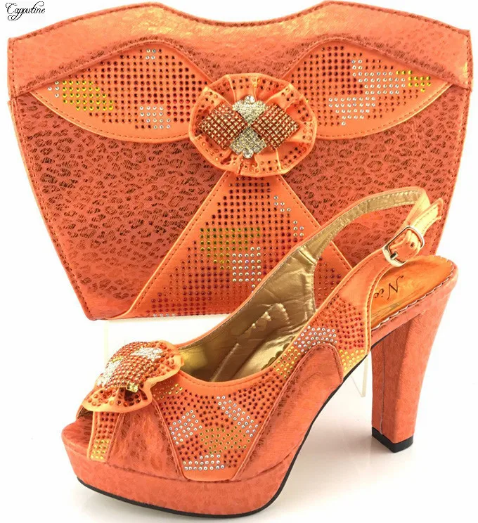 black and orange high heels