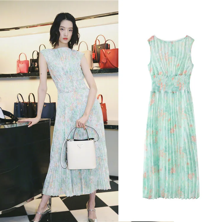 

New with small pure and fresh and elastic waist sleeveless chiffon printing in the round collar long pleated dress G0526