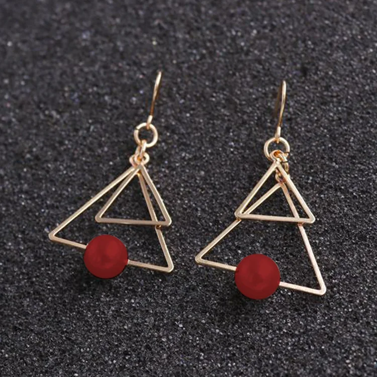 

Han edition contracted red round pearl earrings fashionable joker to double the size of the triangle earrings