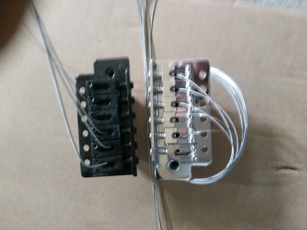 

Electro-acoustic guitar bridge White Black Gold   Single roll electric guitar bridge