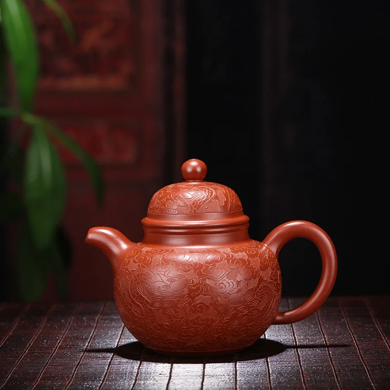 

Dark-red Enameled Pottery Teapot Raw Ore Bright Red Panlong Ball Dark-red Enameled Pottery Teapot Kungfu Online Teapot Tea Set