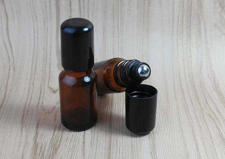 10pcs/lot 10ml Amber fragrance glass bottle Essential Oil Glass Roller ball Aromatherapy Bottle with Black lid household mute aroma diffuser 7 led color branch wood grain aromatherapy humidifier with 400ml water bottle black au plug