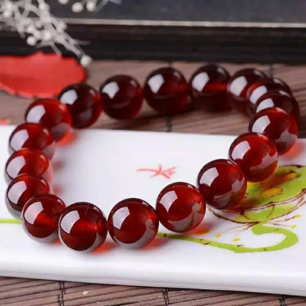 

Genuine Natural Orange red Garnet Quartz Crystal Transparent Round Bead Charm Bracelet 12mm