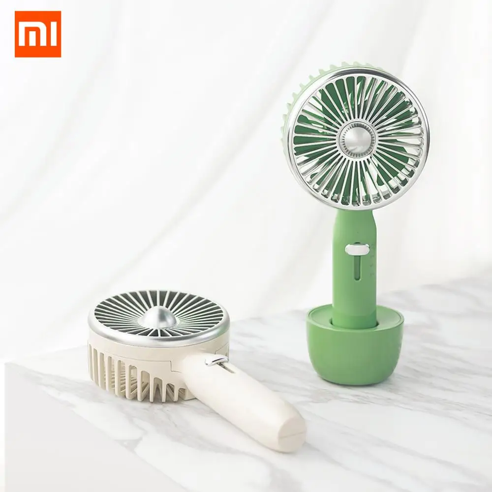 

Guildford Handheld Retro Mini Fan With Rechargeable Built-in 2000mAh Battery USB Port Design Handy Mini Fan