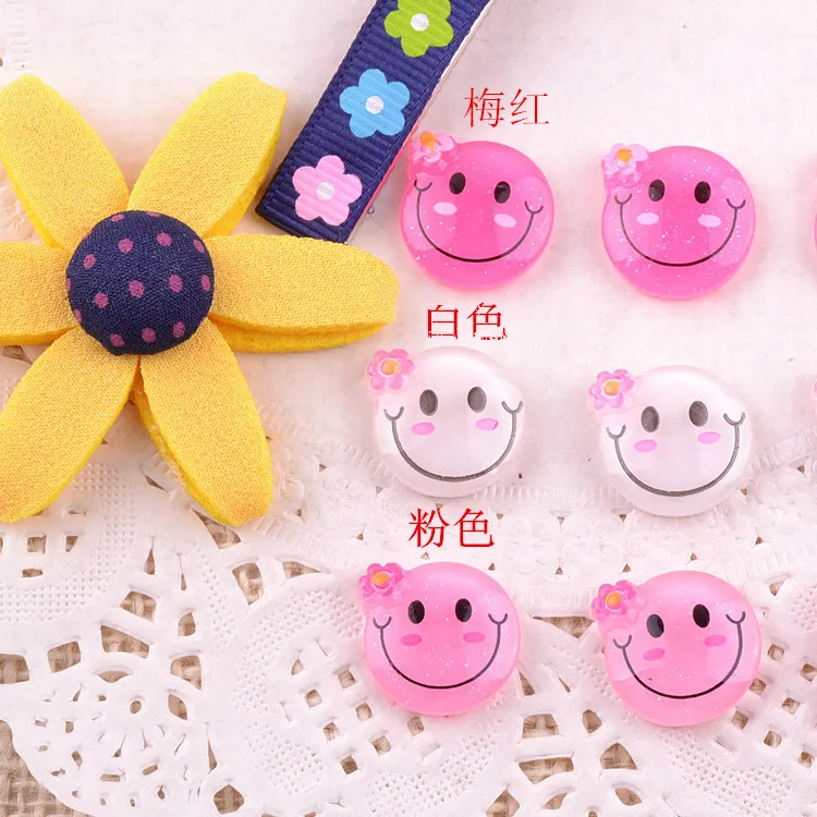 

100pcs/lot hot sell smile doll Resin Cabochon Flat Back Girls Hair Bow Center Making Boys Crafts DIY 15mm