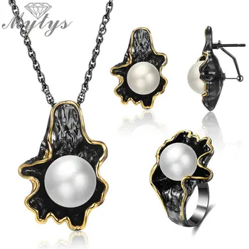

Mytys Big Pearl Black Gun Jewelry Sets Women Earrings Necklace Ring Set Pearl Leaf Design Gold Wire Frames Vintage Noble Jewelry