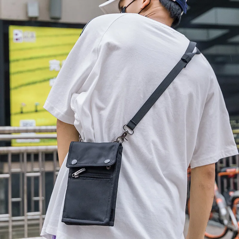 man bag with shoulder strap