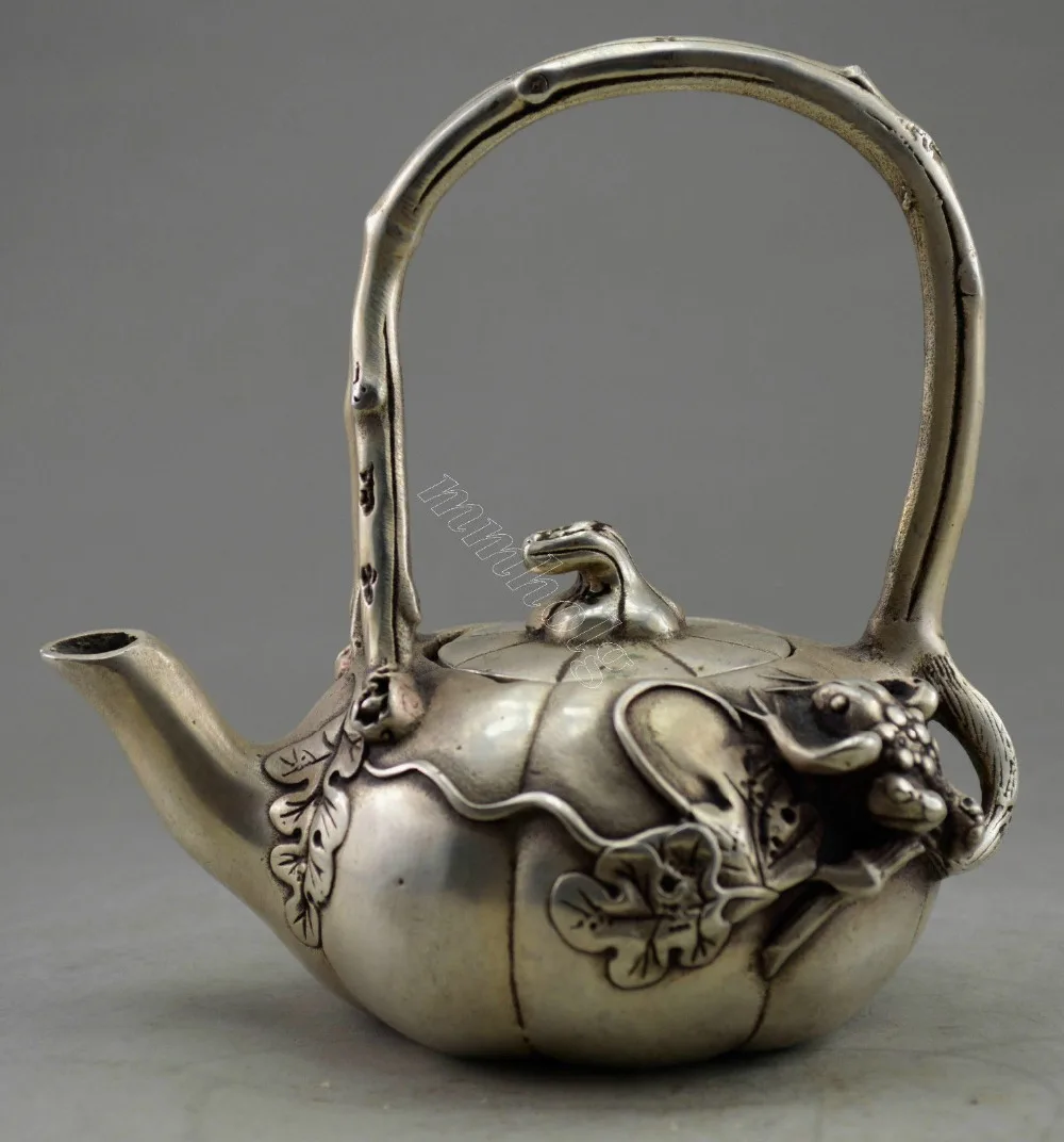 

Exquisite Interesting Chinese Collectible Decorated Old Handwork Tibetan Silver Frog On Pumpkin Statue Teapot
