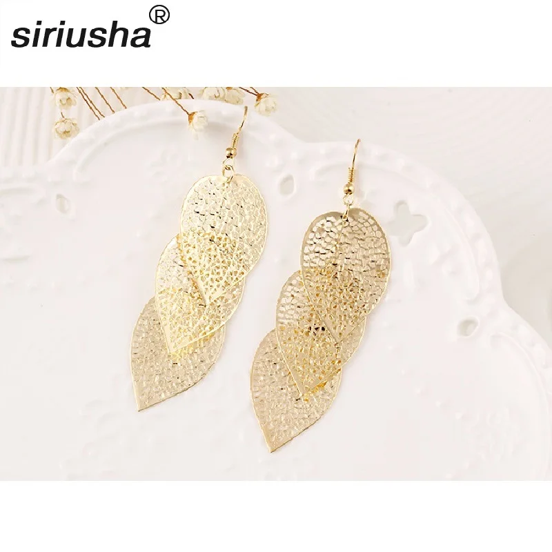 

Hollow Double-sided Metal Leaf Fashion Personality Earrings Big temperament High-end Earrings Jewelry Wholesale S266
