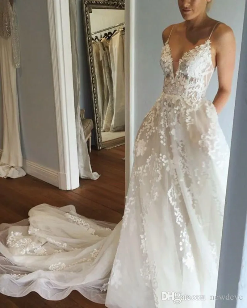 sexy-backless-wedding-dresses-spaghetti-neck-sleeveless-bridal-gowns-lace-applique-court-train-a-line-plus-size-wedding-dress (1)