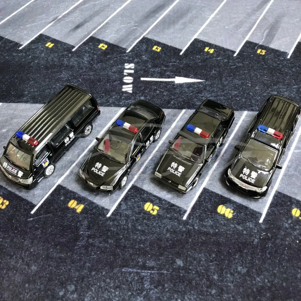 Набор из 4 игрушечных моделей полицейских автомобилей длиной 7-8 см (металлические