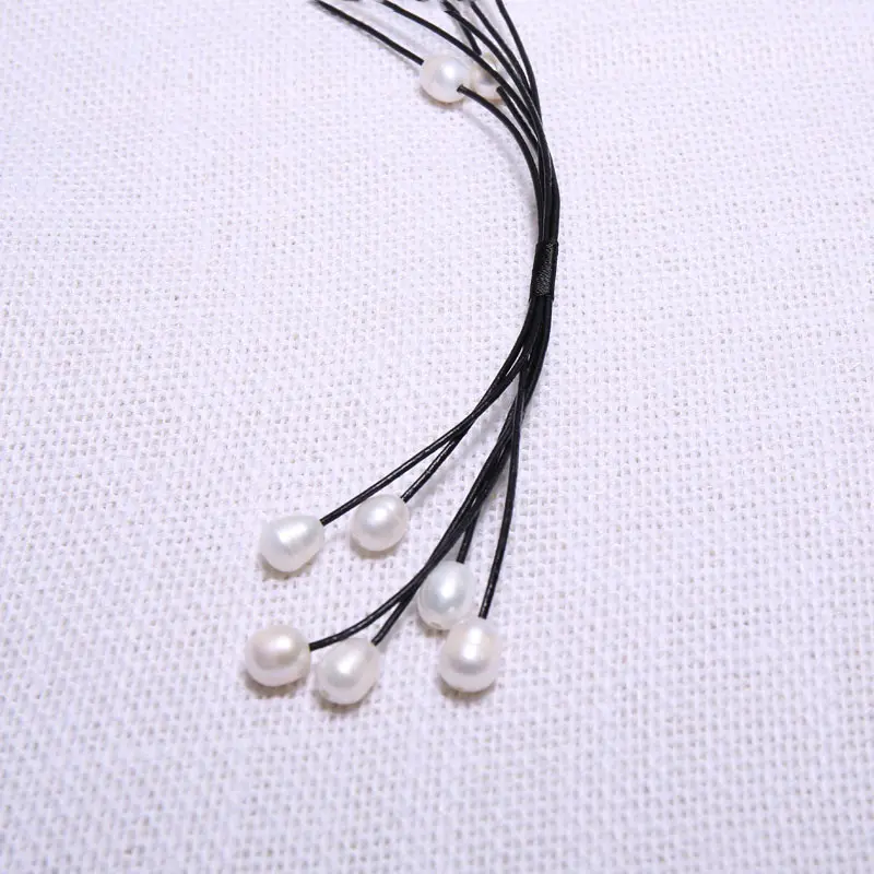 Black Leather 10-11 mm String Pearl Necklace 68 cm Long, 5 Star Pendant 10.5 cm Long